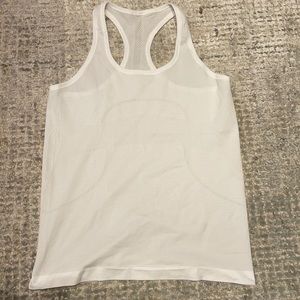 Never worn. Swiftly tech racer back